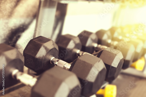 Dumbbell weights in fitness center