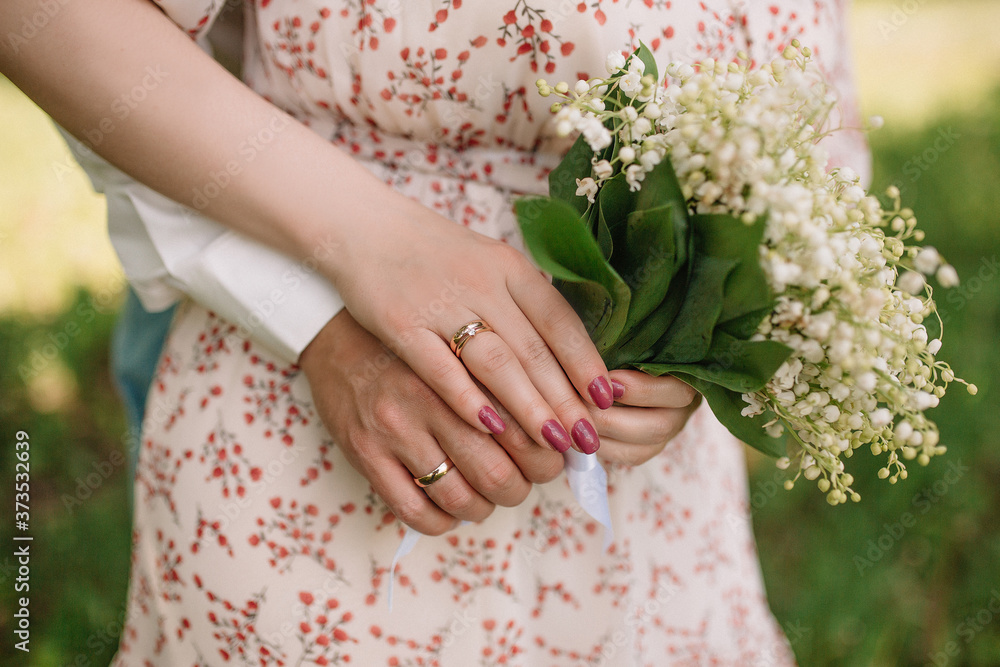 bride and groom holding hands
