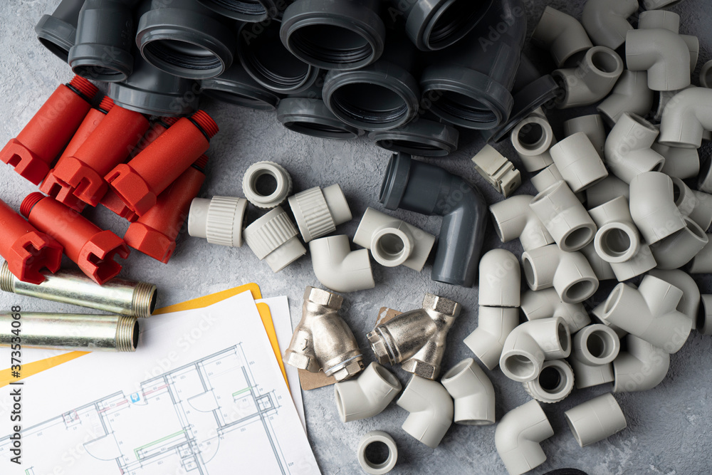 Pipeline In House House plumbing and house sewerage background with pipes and fittings ...