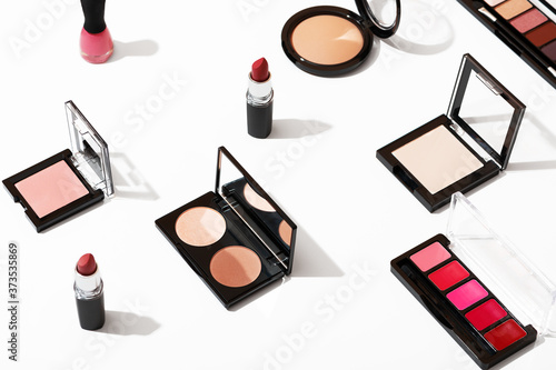 Wallpaper Mural Set of professional cosmetics for fashionable makeup on white background isolated. Beauty industry products top view. Women's cosmetic accessories, lipstick, eye shadow, powder, blush and nail polish. Torontodigital.ca