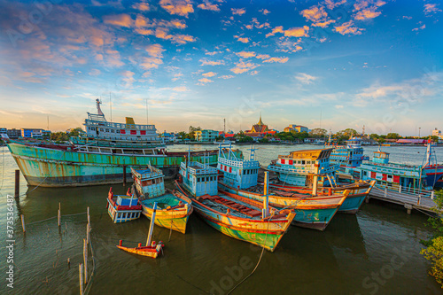  Many boats moored in sunrise morning time at Chalong port, Main port for travel ship to krabi and phi phi island, Phuket, Thailand