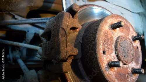 Opening a rusted brake caliper with a screwdriver