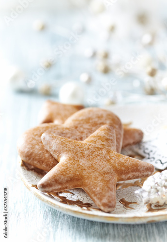 Christmas gingerbread cookies on wooden background. Close up.
