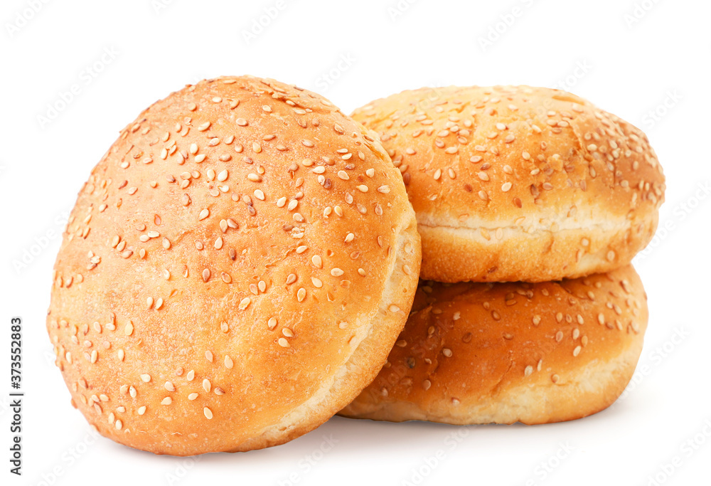 Three burger buns on a white background. Isolated Three burger buns on a white background. Isolated