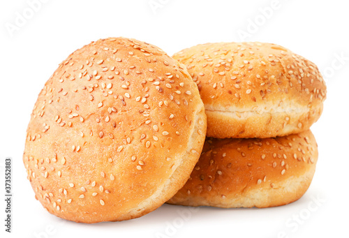 Three burger buns on a white background. Isolated