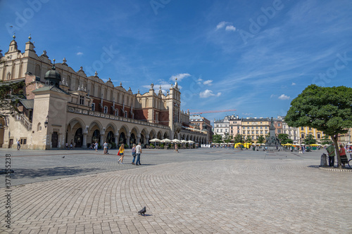 historic old town square in Krakow on a warm summer holiday day