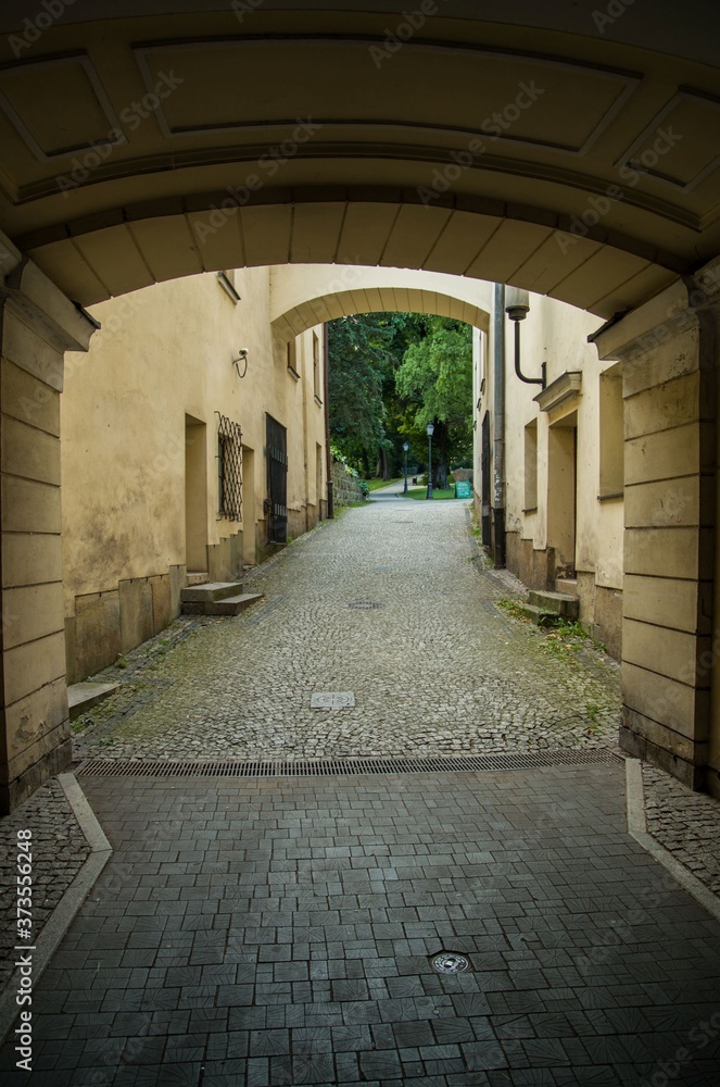 Narrow street to castle hill in polish town Cieszyn, Poland Narrow street to castle hill in polish town Cieszyn, Poland