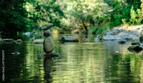 photo of stone balancing in a river landart photo