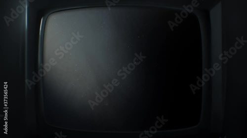 Old vintage TV turning on and turning off animation. 70s, 80s style television. White noise effect on the screen. Analog Static Noise texture. Monochrome, black and white offset flicker. Screen damage