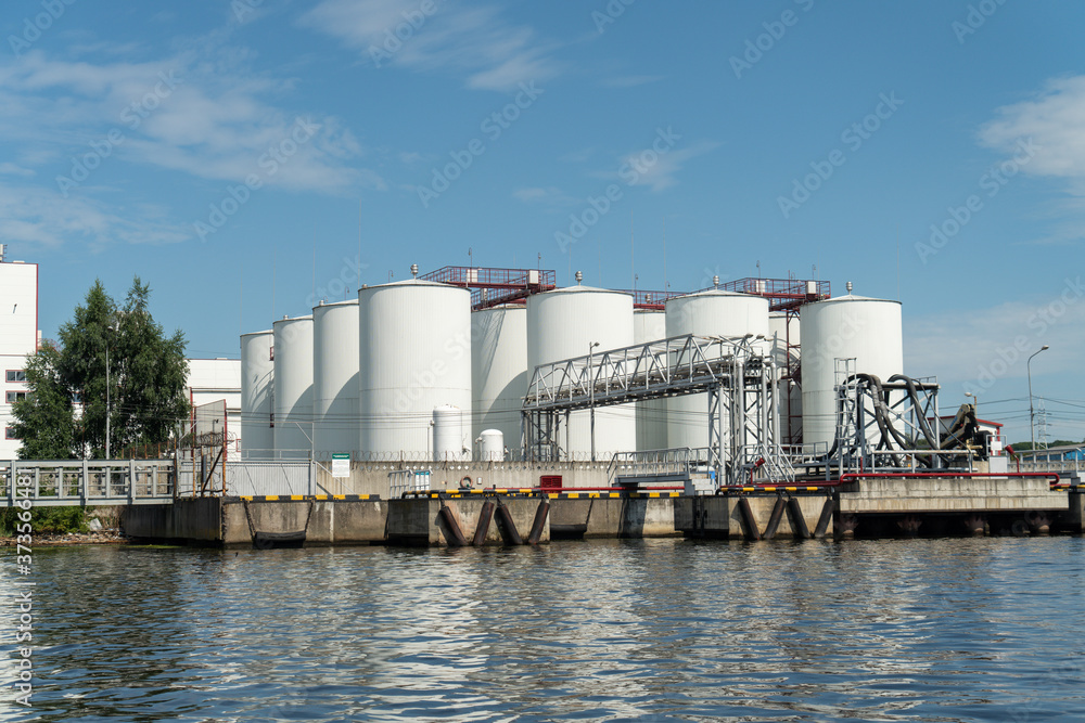 industrial fuel tanks in the seaport, large Industrial tanks for petrol and oil