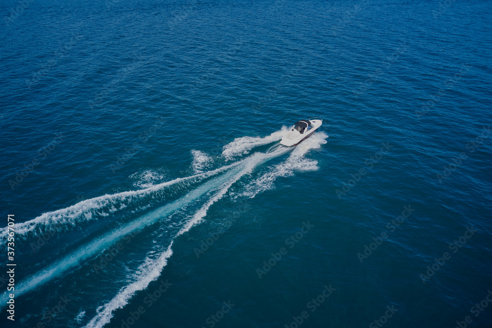 Aerial view on the sea and boat. Beautiful natural seascape at the summer time