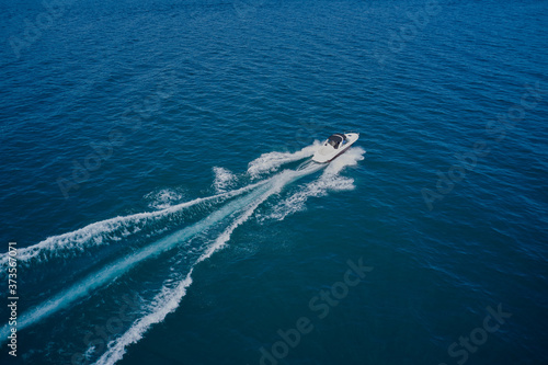 Aerial view on the sea and boat. Beautiful natural seascape at the summer time