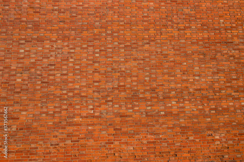 old red brick brick wall in daylight