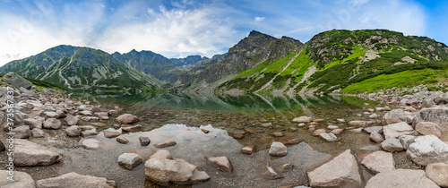 Panorama from polsih Tatra mountains - gasienicowy black pond photo