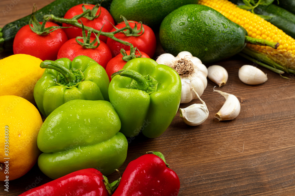 Fresh organic vegetables on wooden background. healthy eating concept. food background.