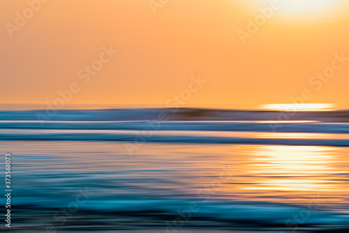 Fototapeta Naklejka Na Ścianę i Meble -  Abstract seascape with blur panning motion. Scenicseascape, sunset over sea