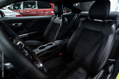 Luxury sports car black leather seats. © Daniel Jędzura