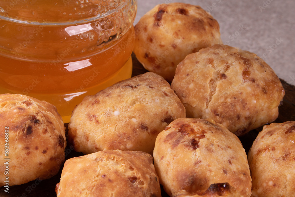 typical Brazilian snack: tapioca dumpling with honey typical Brazilian snack: tapioca dumpling with honey