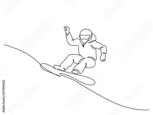 Young snowboarder man ride fast snowboard at snowy mountain.