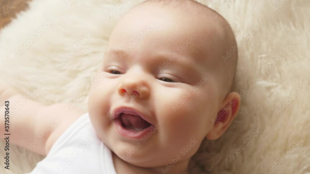 cute little baby infant newborn toddler portrait smiling to camera looking cute little baby infant newborn toddler portrait smiling to camera looking