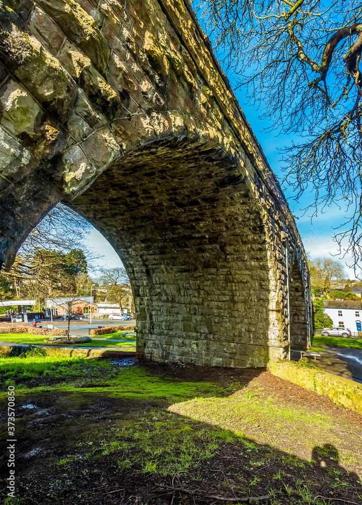 A view from underneath the railway viaduct in the seaside town of Tenby, Pembrokeshire on a sunny day