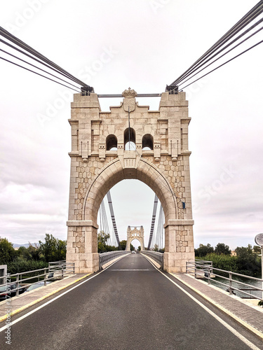 Amposta suspension bridge over the Ebro river in Tarragona photo