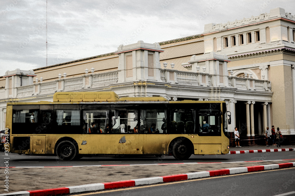 Fototapeta premium A Yellow public bus at Hua Lamphong Railway Station in Bangkok Thailand 