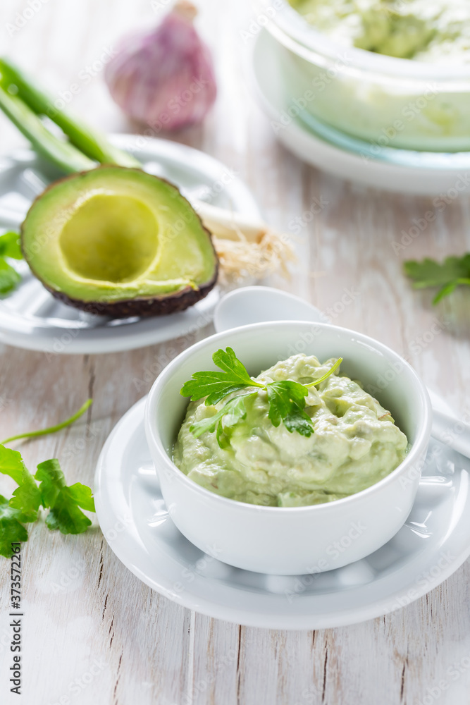 Avocado spread with curd cheese and ingredients Avocado spread with curd cheese and ingredients