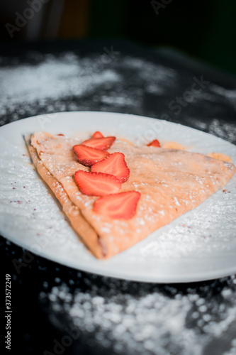 delicious crepe with fresh strawberries
