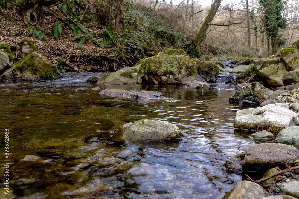 Water stream river mountain creek flowing over rocks, Papuk, Croatia Water stream river mountain creek flowing over rocks, Papuk, Croatia