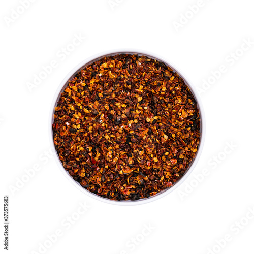 Fire Roasted or Sun Dried Tomatoes Spice Isolated on White Background. Macro with Selective focus.