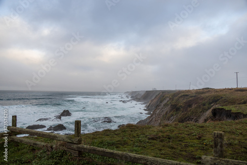 Waves breaking on California coastline 