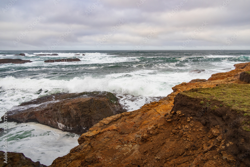 Waves breaking on California coastline 
