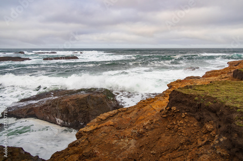 Waves breaking on California coastline © Martina