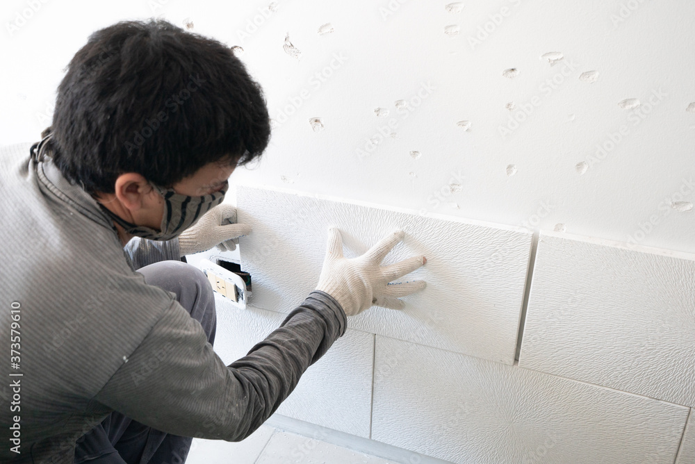 installation of gypsum boards on the wall in the apartment installation of gypsum boards on the wall in the apartment