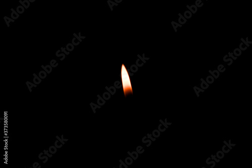 Closeup of burning flame isolated on black background