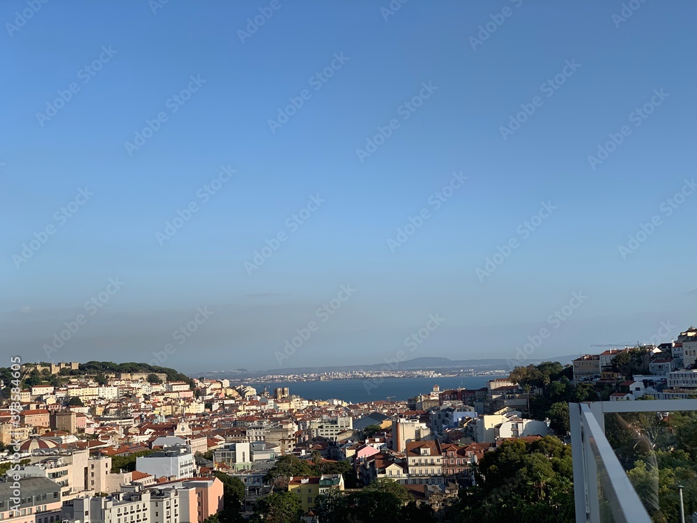 View of the historical Lisbon downtown and Tagus / Taje River from a rooftop, Portugal