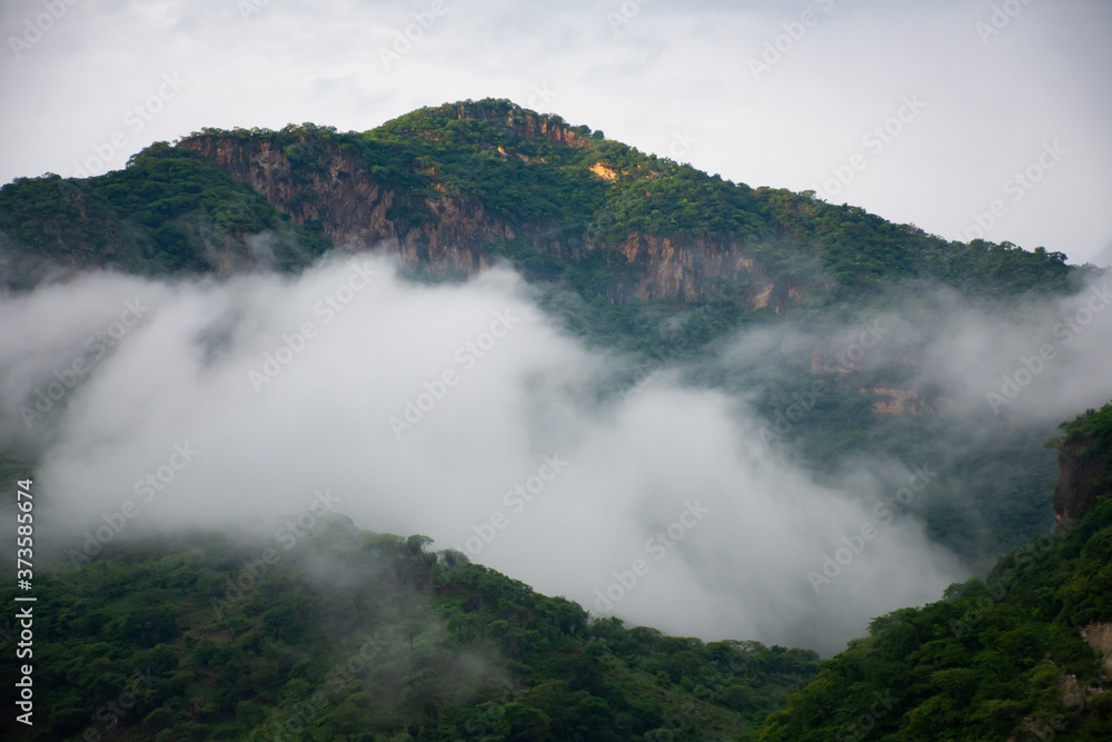 cloudy green mountain landscape