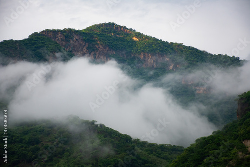 cloudy green mountain landscape