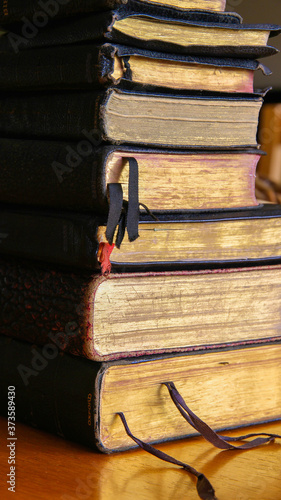 Stack of old books in a library.