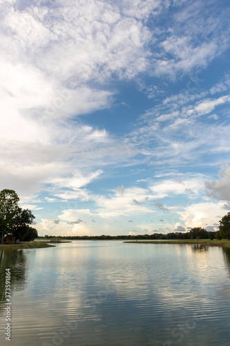 A lake in New Orleans, Louisiana with clouds in the sky © Josh