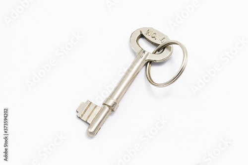 Old key on white © somkak