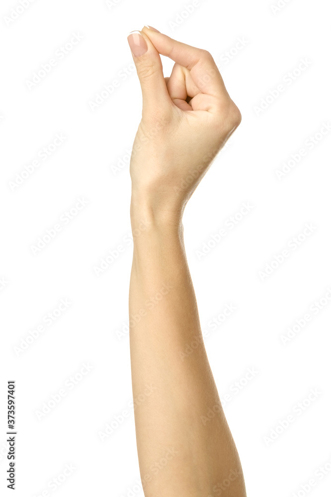 Giving, reaching or holding hand. Woman hand gesturing isolated on white Giving, reaching or holding hand. Woman hand gesturing isolated on white