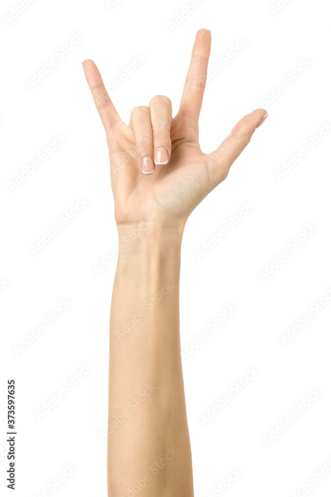 Rock and roll. Woman hand gesturing isolated on white Rock and roll. Woman hand gesturing isolated on white