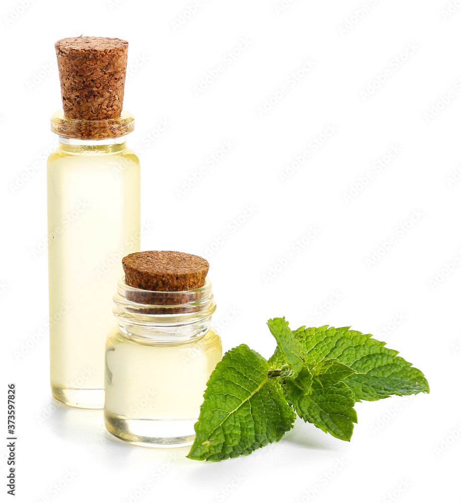 Aromatic mint oil on white background Aromatic mint oil on white background