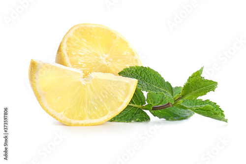 Fresh lemon and mint on white background