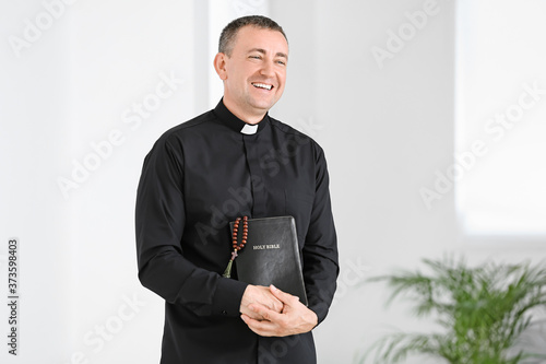 Cuadro en lienzo Portrait of male priest at home