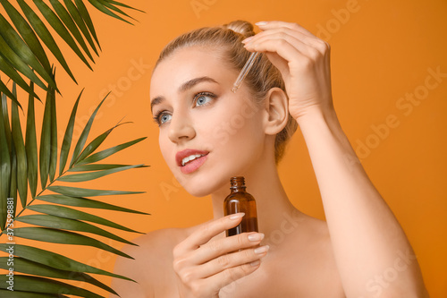 Beautiful young woman with ...