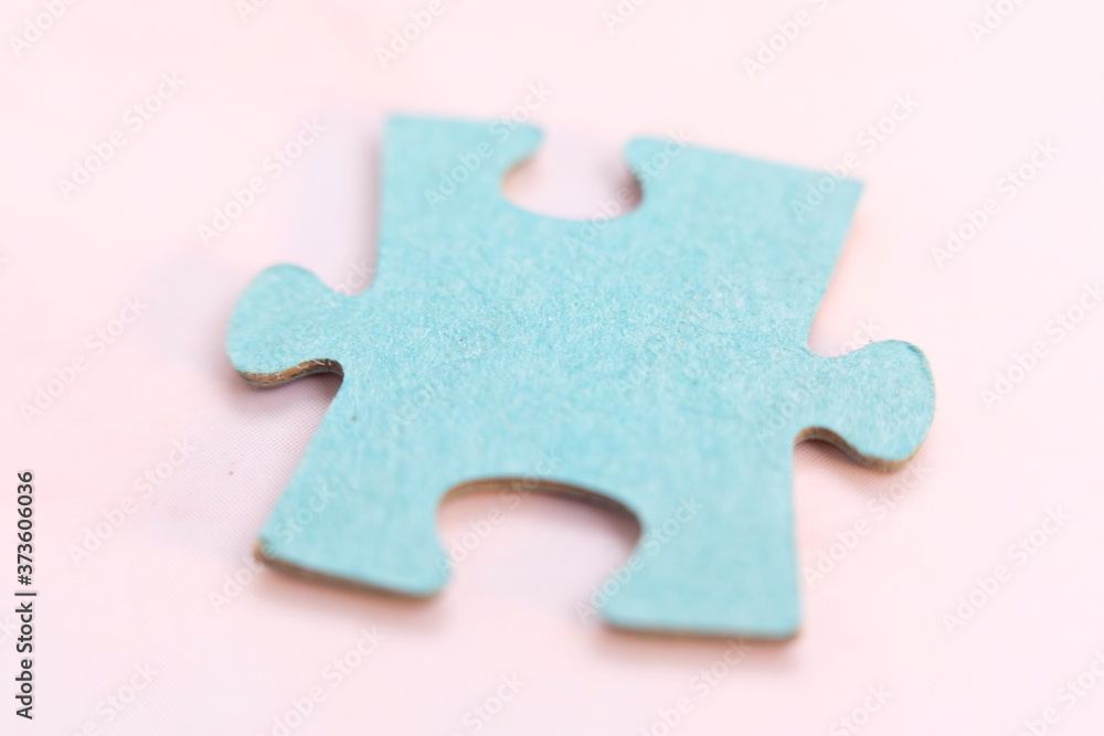 Close up Jigsaw puzzle. Business solutions, success and strategy concept. Businessman concept. jigsaw background Close up Jigsaw puzzle. Business solutions, success and strategy concept. Businessman concept. jigsaw background