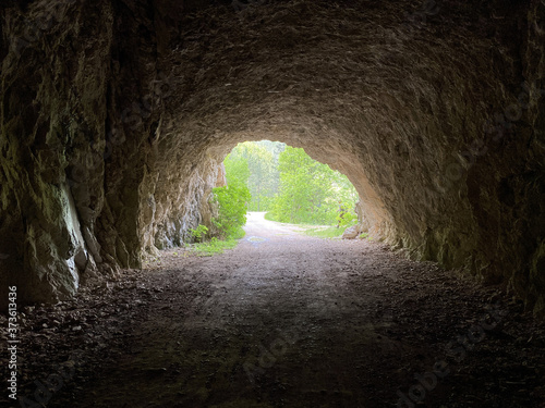 Cave tunnel with a road ear Erma river gorge, Bulgaria